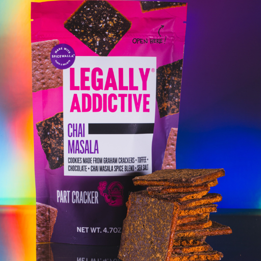 Snack pouch labeled 'LEGALLY ADDICTIVE' with purple-pink gradient and a chocolate-square image