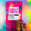 Pink snack package labeled 'LEGALLY ADDICTIVE' and 'THE O.G.' with stacked chocolate bars in foreground.